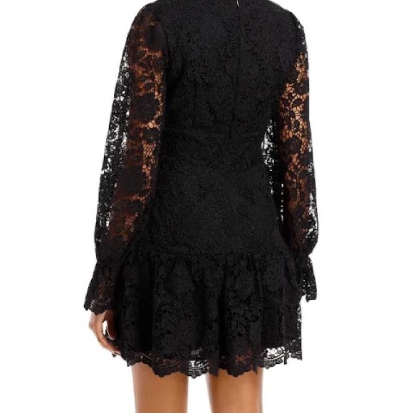 V-neck/O-ring detail Long sleeves A-line silhouette Concealed back zip closure - Picture 3 of 11